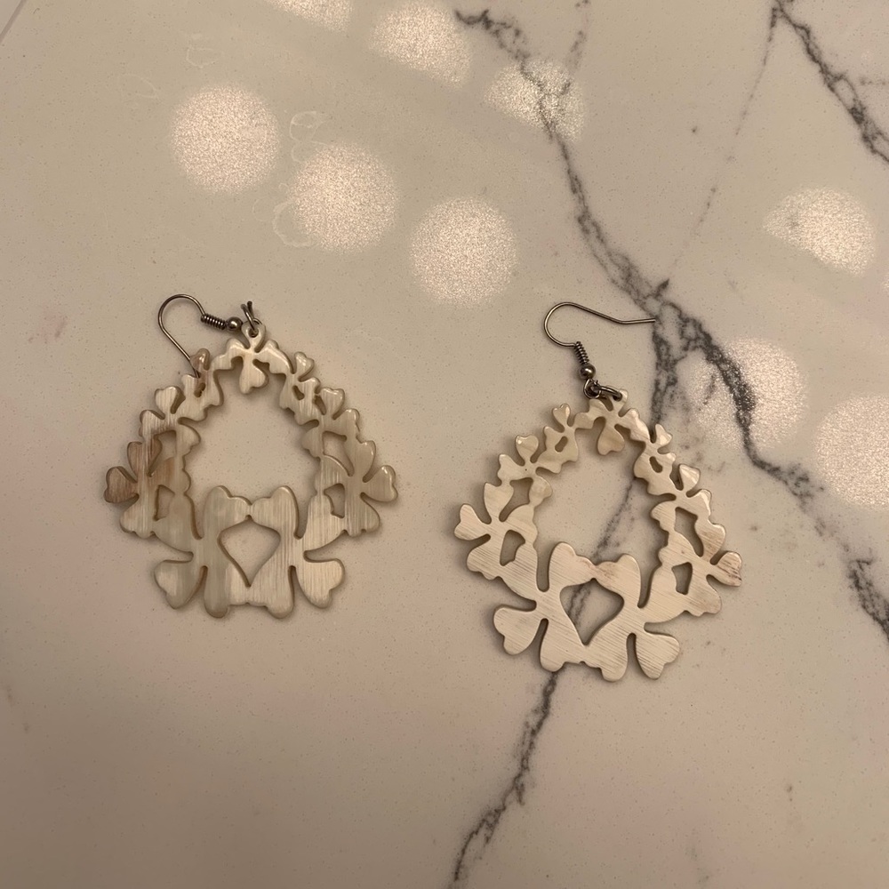 Noonday earrings. Ivory colored